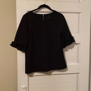 Black top with sleeve detail